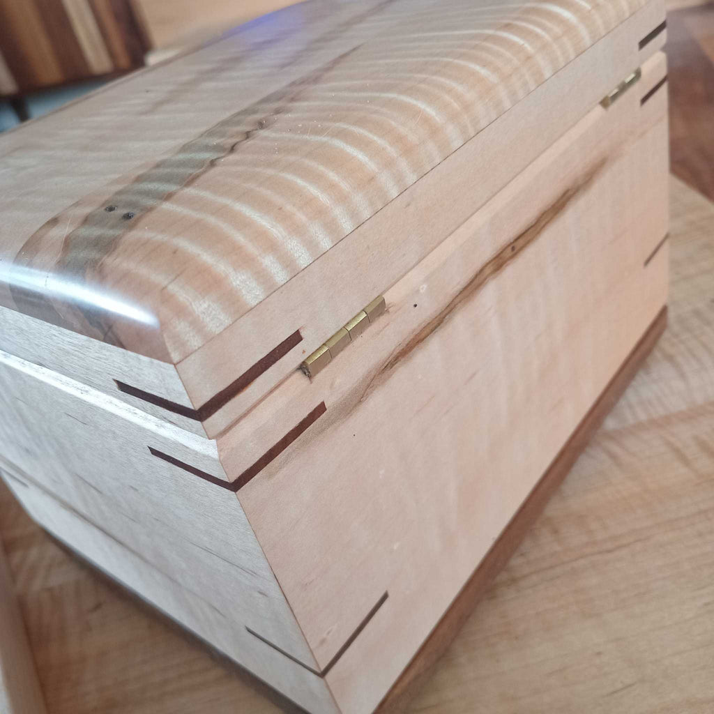 Elegant hardwood memory keepsake box with felt lining and brass hinges for preserving precious memories