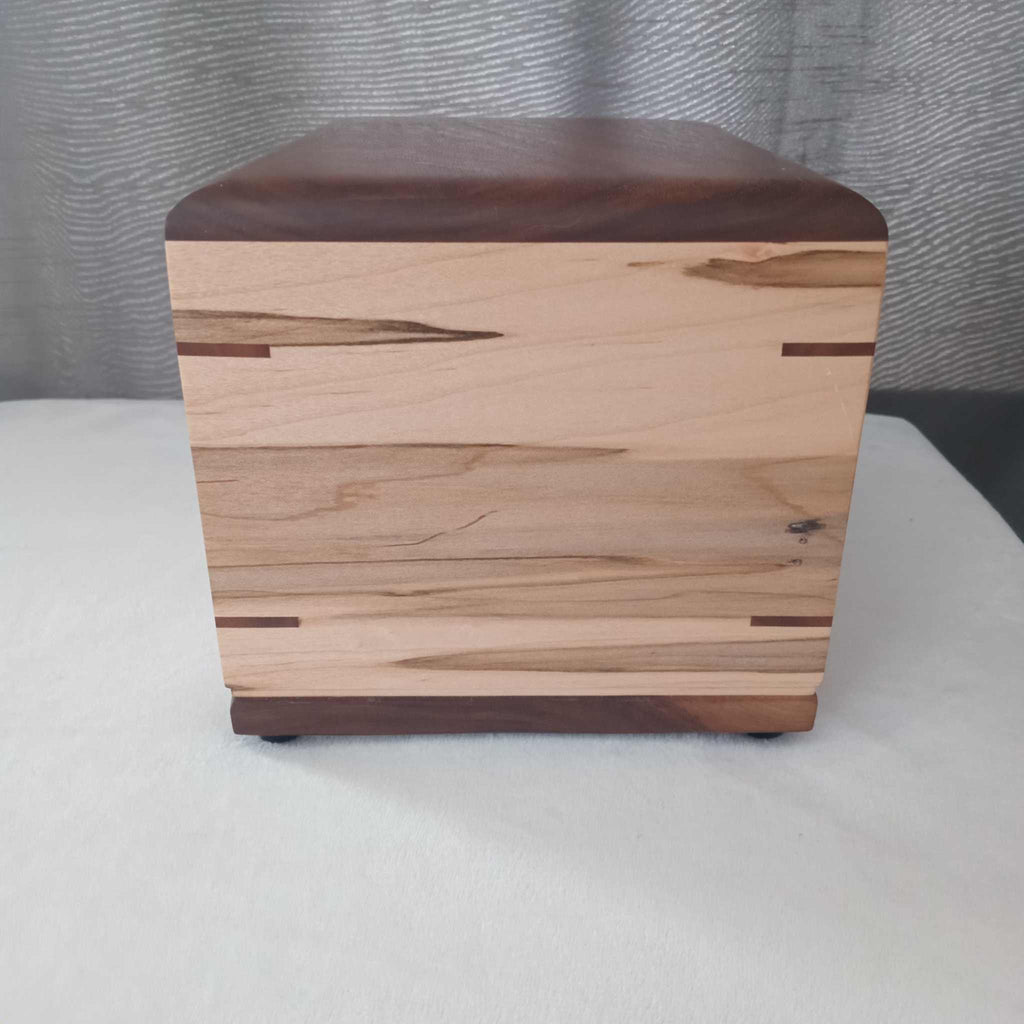 Personalized custom hardwood Camelia urn handcrafted with a smooth natural finish for ashes