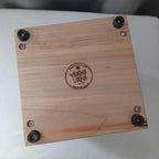 Handcrafted memorial urn made from solid hardwood with simple, natural design for ashes storage