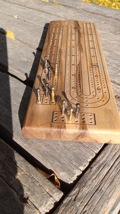 Handcrafted Wood Cribbage Boards with peg storage. A practical gift for all occasions.