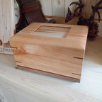 Custom personalized hardwood pet urn with paw prints and photo slot handcrafted in Canada