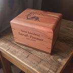 Personalized wooden urn handcrafted from solid hardwood with secure closure and natural design