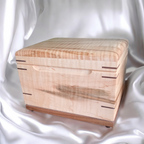 Handmade custom wooden treasure chest urn in Canada with secure closure and personalized engraving options