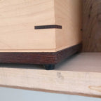 Handcrafted wooden urn for animal ashes with paw prints, made in Canada