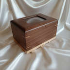 Custom personalized hardwood pet urn with paw prints and photo slot for ashes memorial