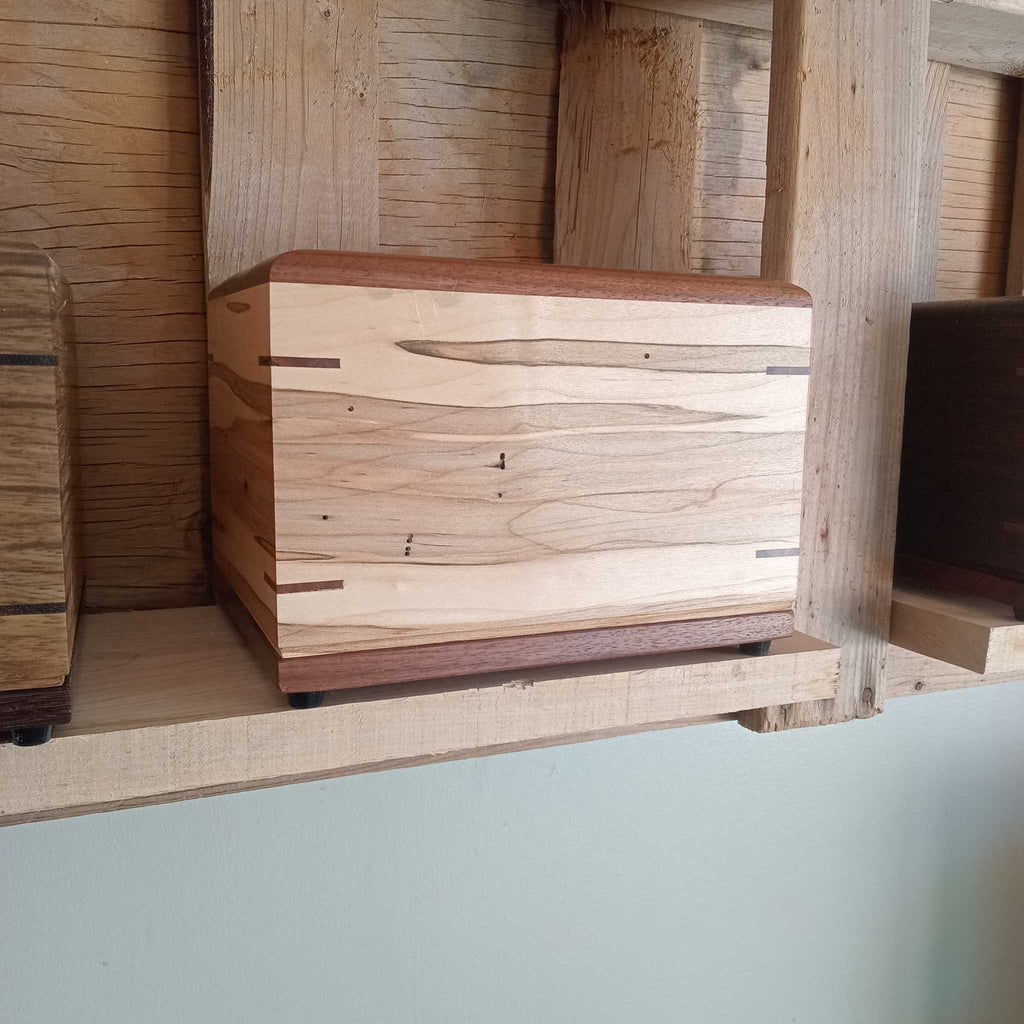 Personalized custom hardwood urn handcrafted from solid wood with elegant design and secure closure