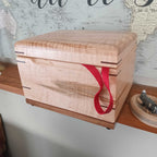 Handcrafted custom wood box urn with paw print design for pet ashes keepsake
