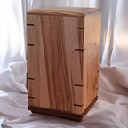 Handcrafted solid hardwood memorial urn for ashes with natural finish and secure closure