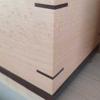 Handcrafted wooden urn for animal ashes with paw prints, made in Canada