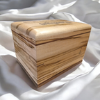 Handcrafted hardwood urn made in Canada, solid wood cremation urn with secure closure and personalized engraving options