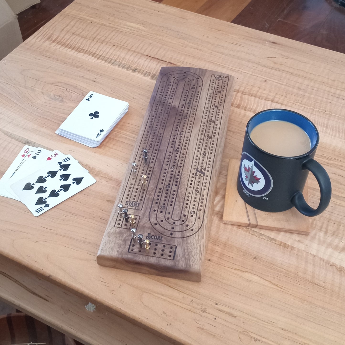 Handcrafted Wood Cribbage Boards with peg storage. A practical gift for all occasions.