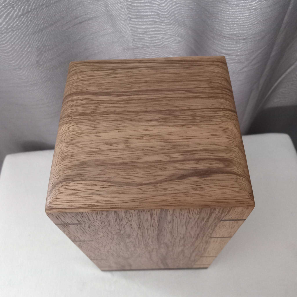 Handcrafted Memorial Urn made from solid hardwood with personalized engraving options