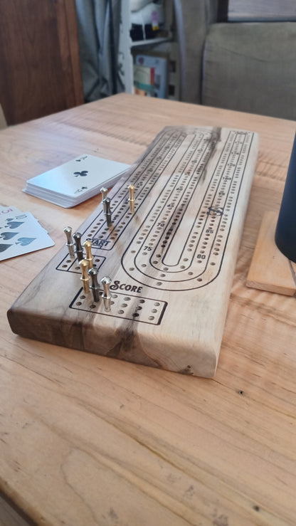 Handcrafted Wood Cribbage Boards with peg storage. A practical gift for all occasions.