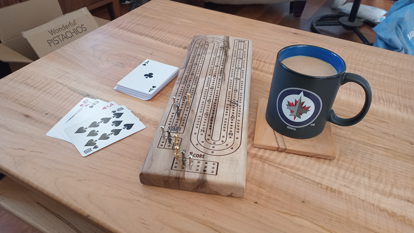 Handcrafted Wood Cribbage Boards with peg storage. A practical gift for all occasions.
