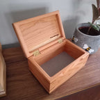 Handcrafted cremation urn for pets made from solid hardwood with custom engraving option