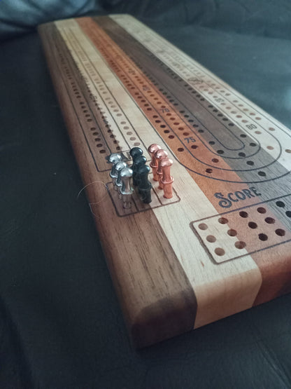 “Handcrafted Multi Wood Cribbage Boards with peg storage. A practical gift for all occasions.