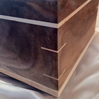 Handcrafted hardwood urn made in Canada with a smooth, timeless design and secure closure for ashes