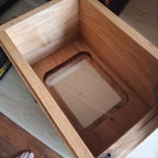 Custom personalized hardwood pet urn with paw prints and photo slot handcrafted in Canada