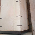 Handcrafted memorial urn made from solid hardwood with a simple, natural design for ashes storage