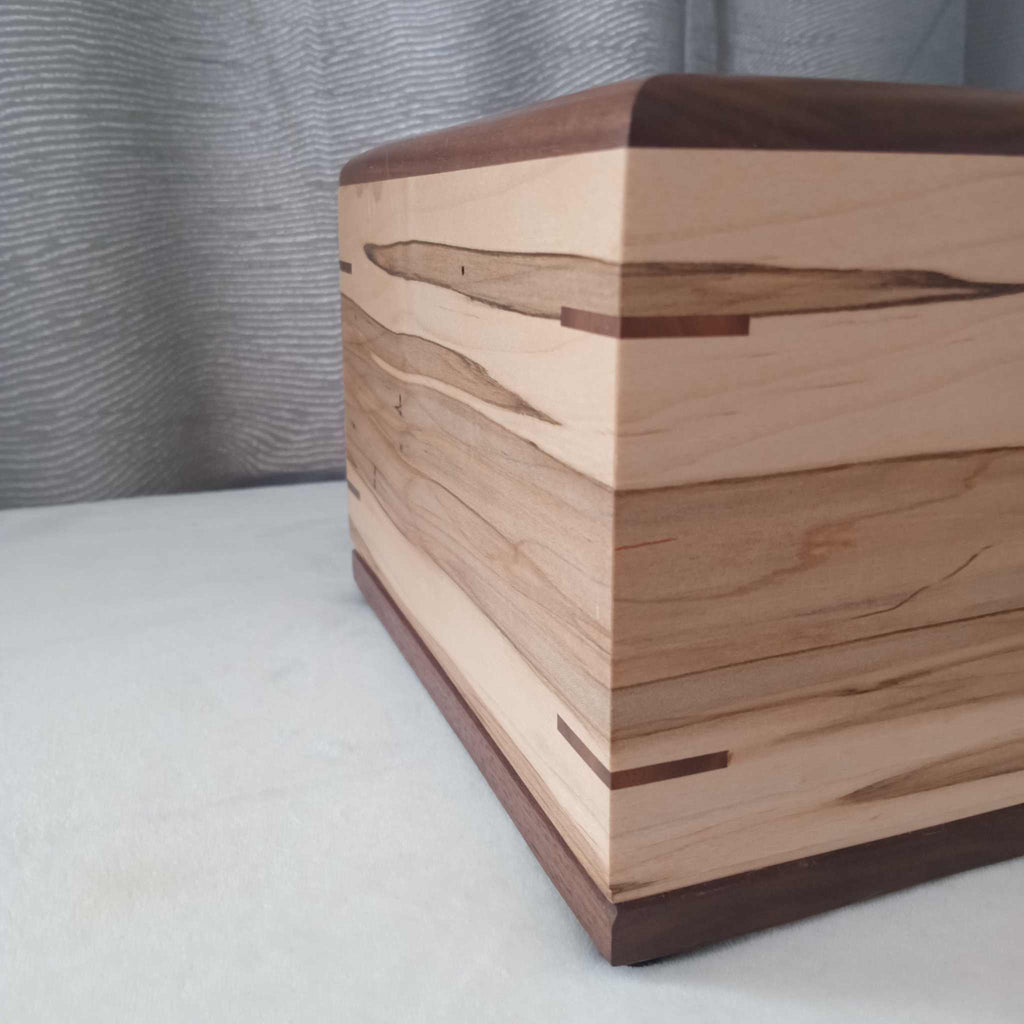 Personalized custom hardwood Camelia urn handcrafted for ashes with elegant design and secure closure