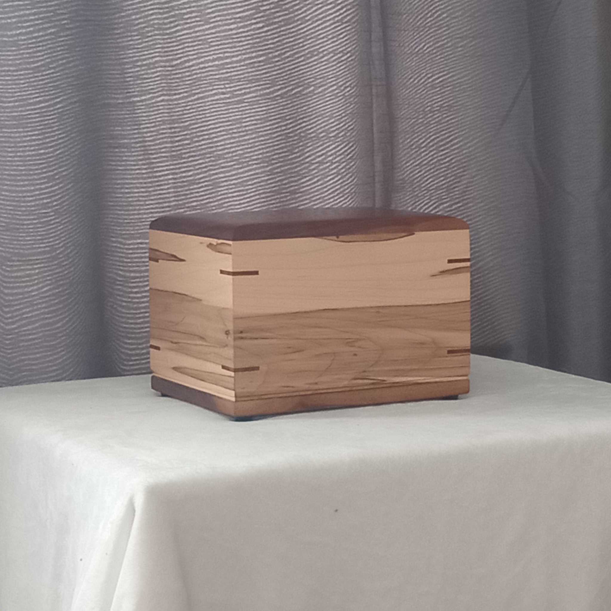 Handcrafted personalized custom hardwood urn for ashes with elegant design and secure closure