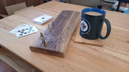 Handcrafted Wood Cribbage Boards with peg storage. A practical gift for all occasions.