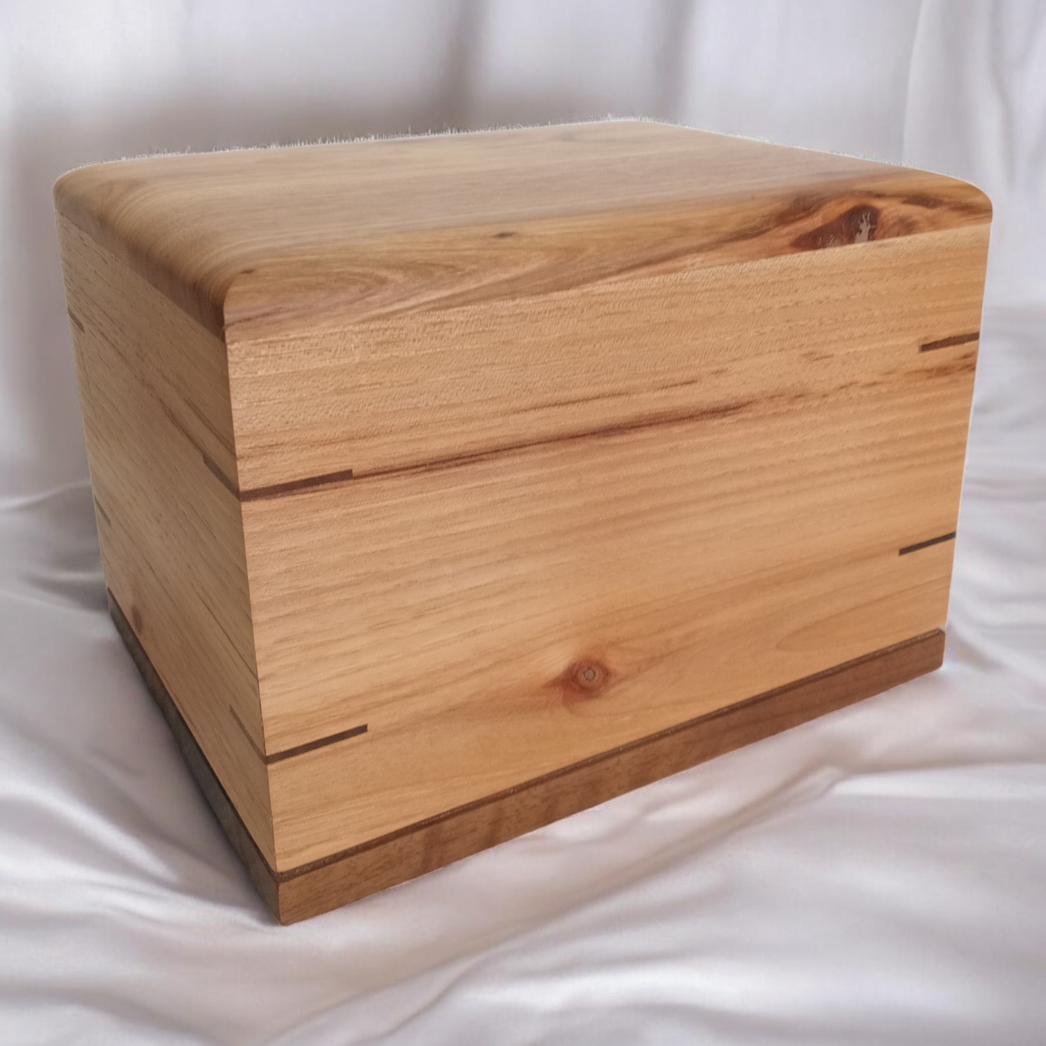 Handcrafted wooden urn for animal ashes with paw prints and custom engraving options