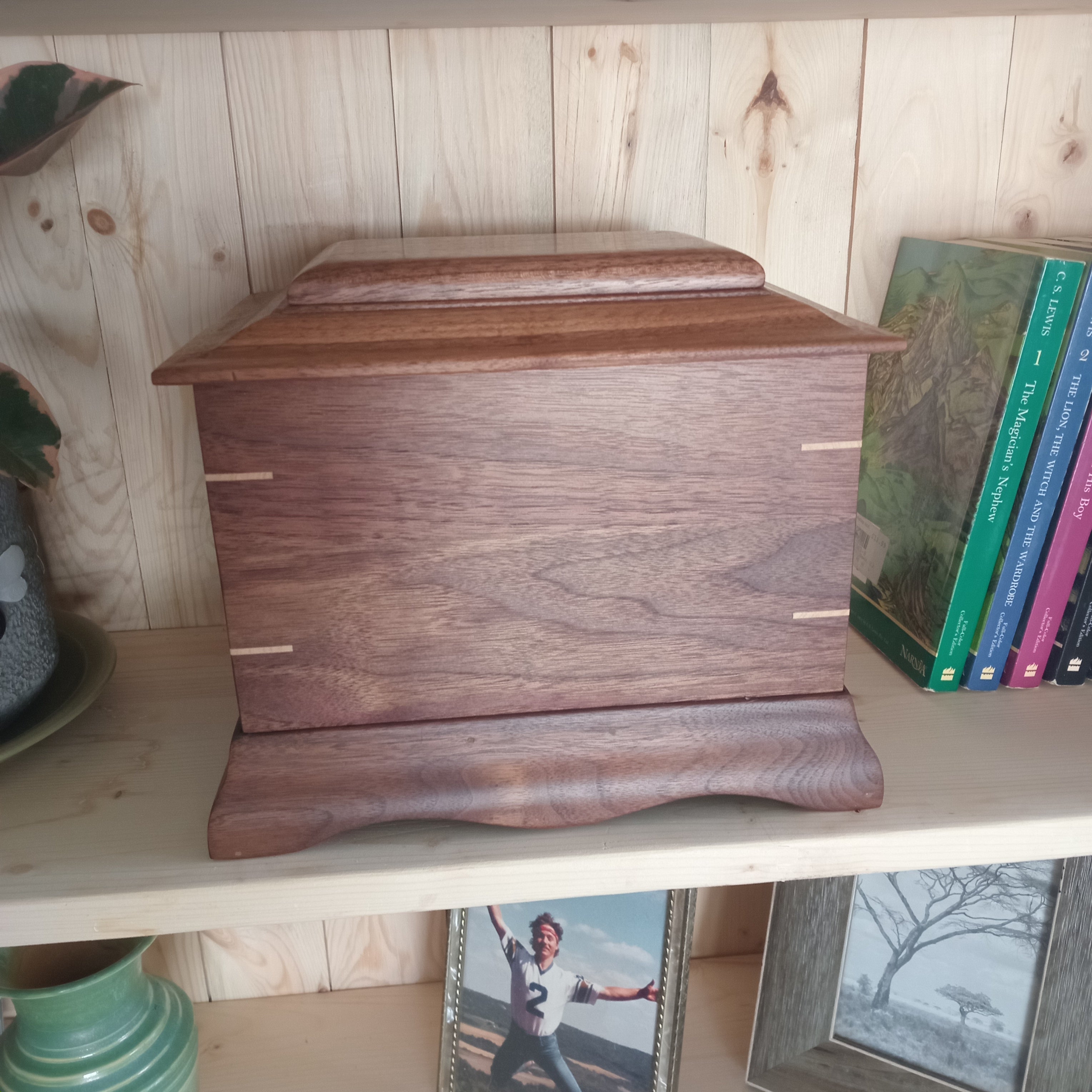 Traditional handmade wooden memorial urn for cremation ashes handcrafted with care and personalized engraving option