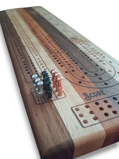 “Handcrafted Multi Wood Cribbage Boards with peg storage. A practical gift for all occasions.