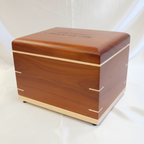 Handcrafted hardwood urn made in Canada with clean design and secure closure for ashes
