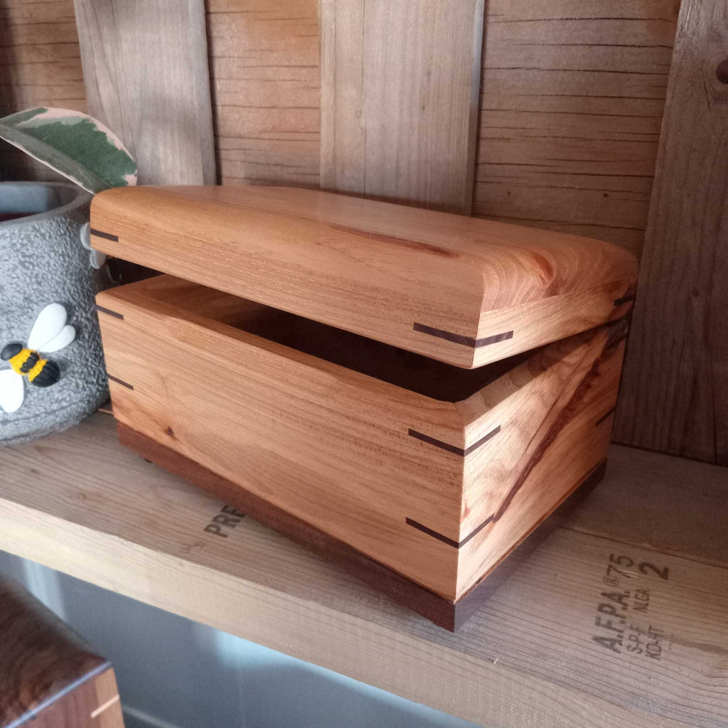 Elegant handcrafted hardwood memory keepsake box with brass hinges and felt lining for preserving treasured items