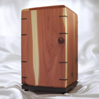 Handcrafted memorial urn made of solid hardwood with natural finish and secure closure