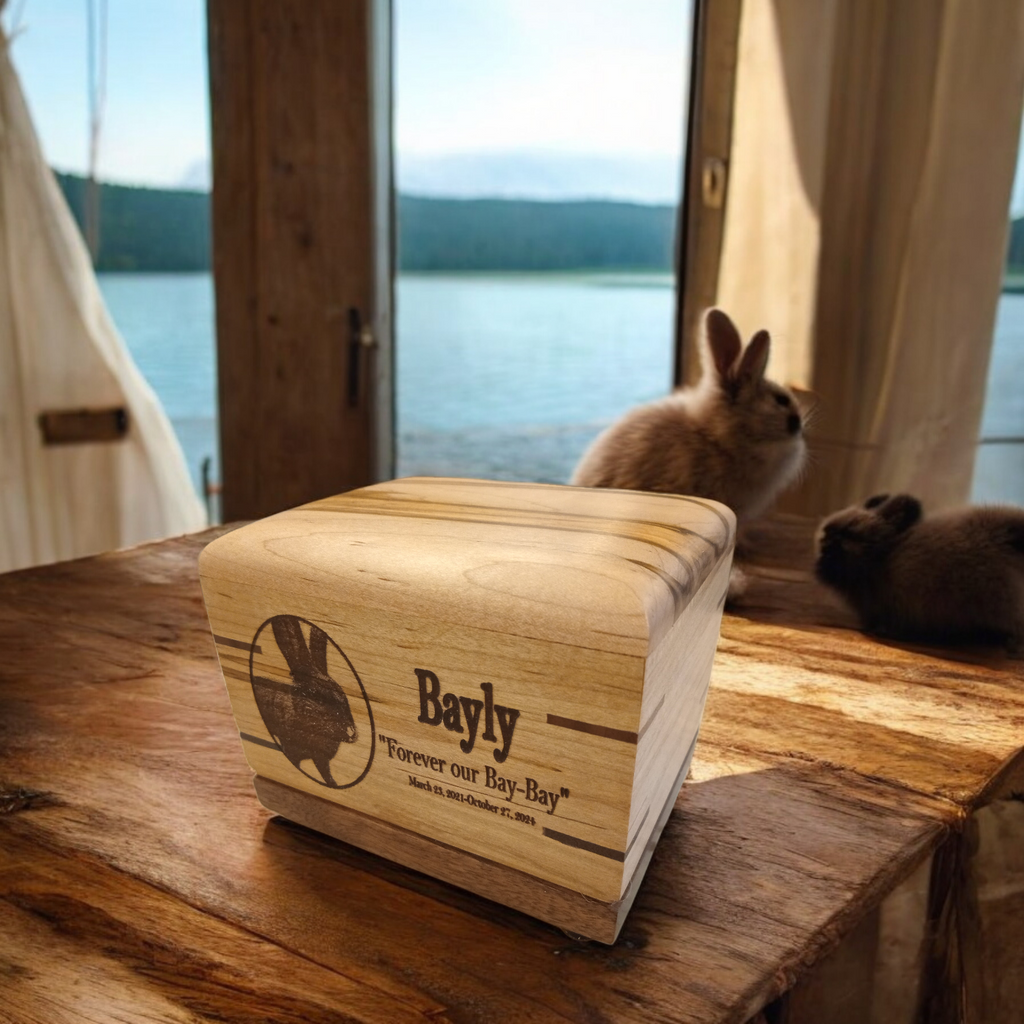 Handcrafted wooden urn for animal ashes with paw prints design, made in Canada