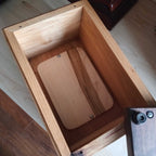 Custom personalized hardwood pet urn with paw prints and photo slot for ashes memorial