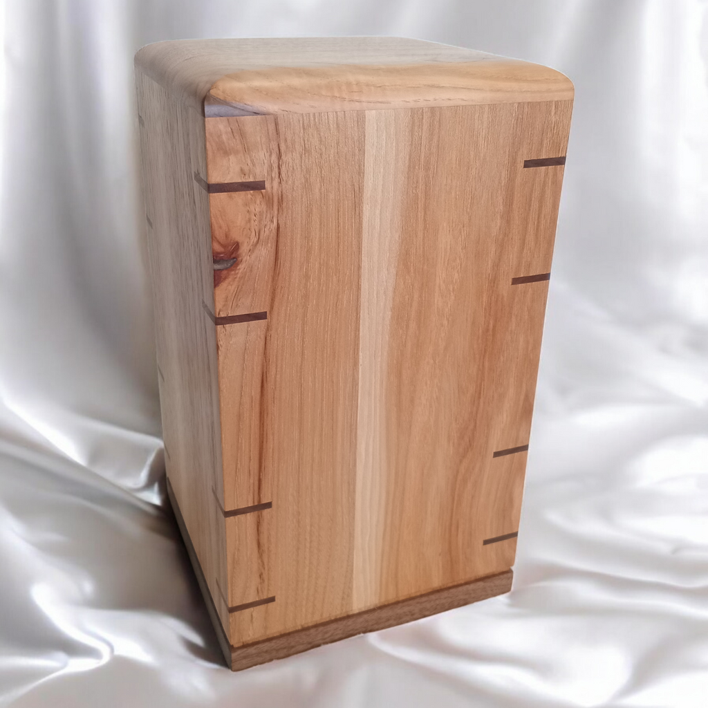 Personalized hardwood pet urn with pawprint engraving and modern design