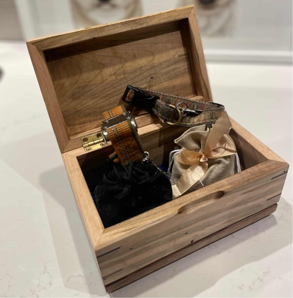 Handcrafted cremation urn for pets made of domestic hardwood with custom engraving options